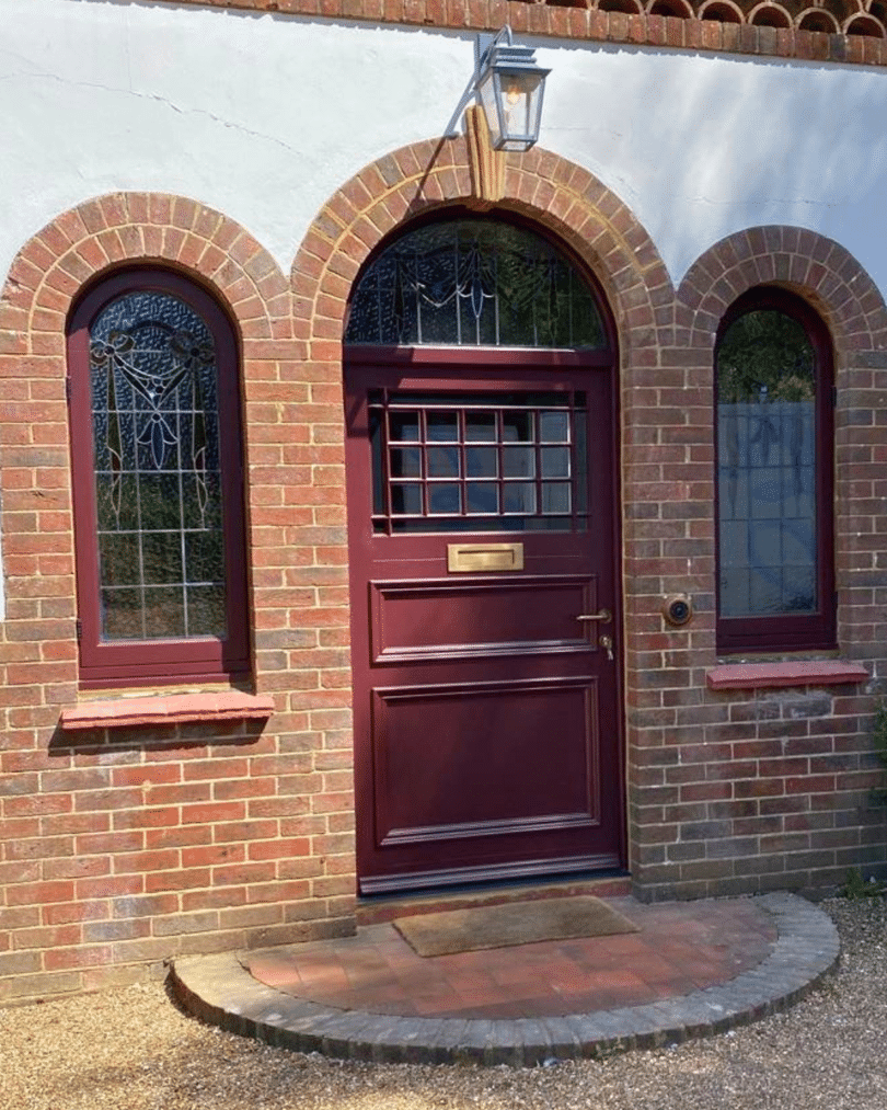 black front door timber alternative with side light