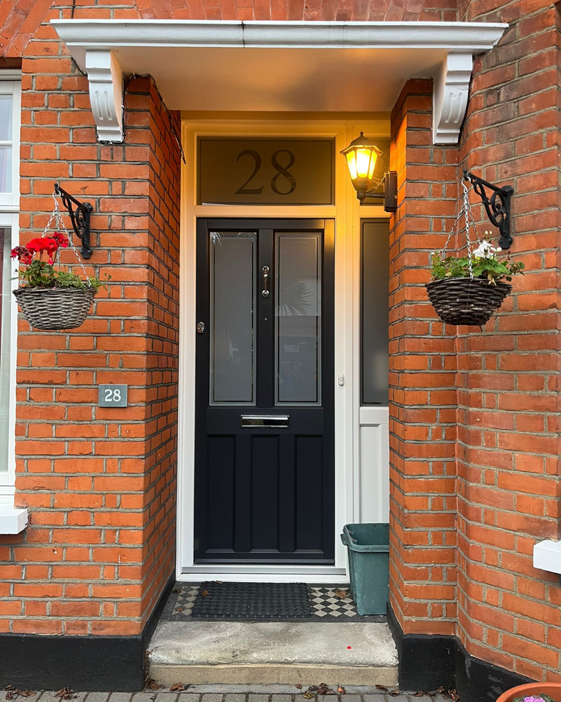 black front door timber alternative with side light